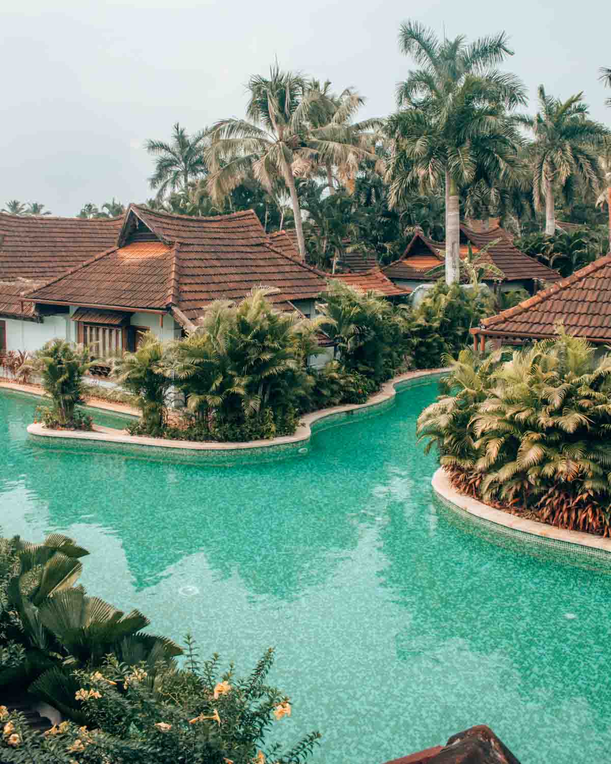 the meandering pool connecting the villas